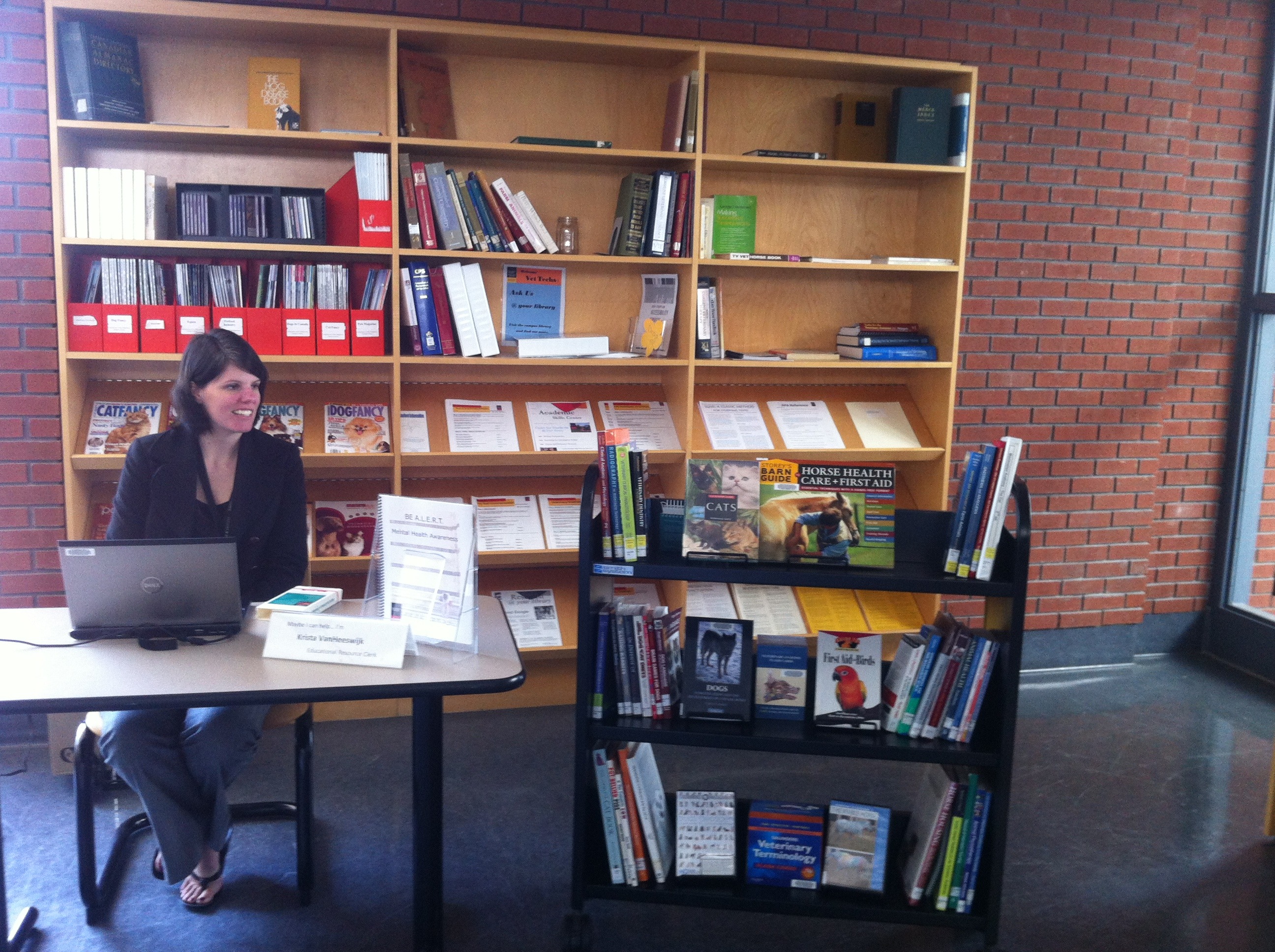 Krista van Heeswijk staffing the Pop-Up Library at Ridgetown Campus, UG